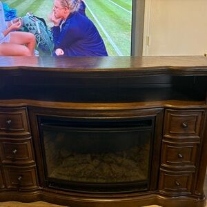 Classic Brown Wooden TV Stand with Fireplace